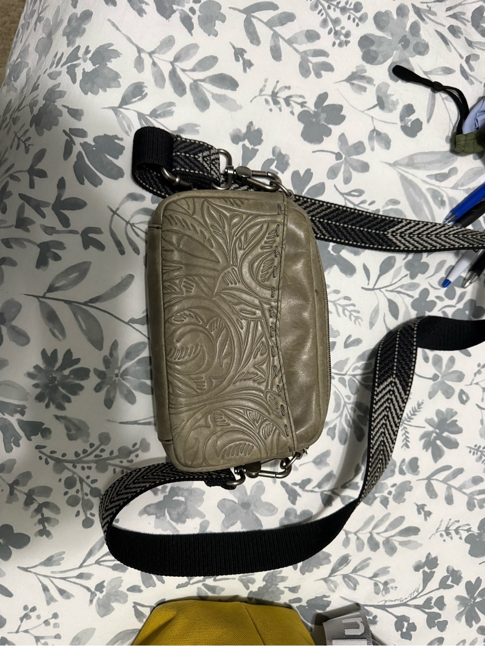 The Sak Olive Embossed Leather Crossbody Bag with Patterned Strap